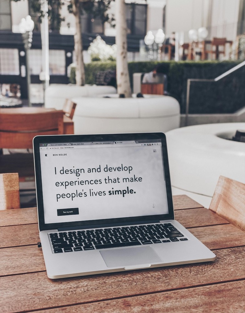 Modern Responsive Business Website Interface on Laptop Screen